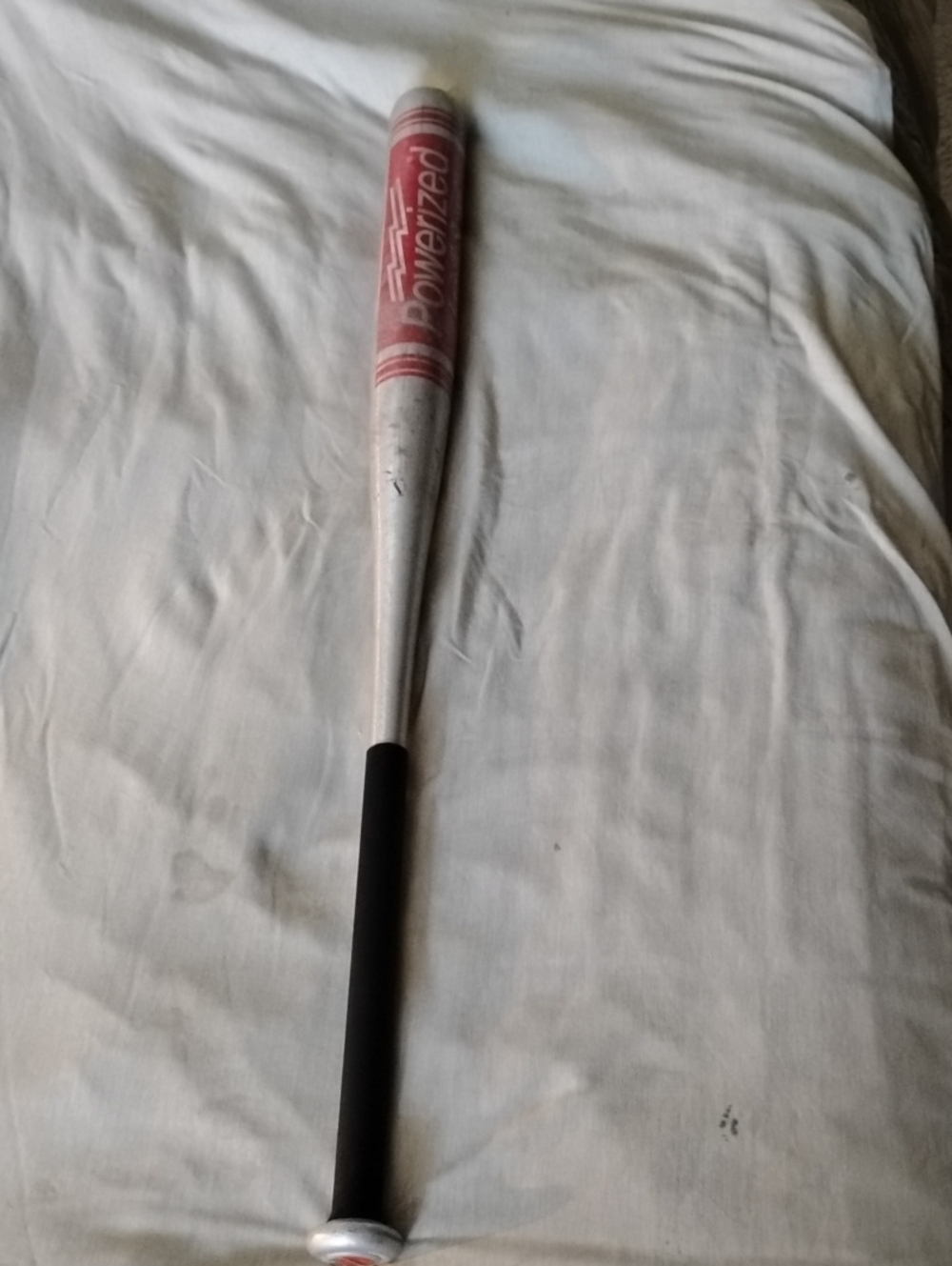 Powerized Louisville Slugger Softball Bat with Black Grip And Red Barrel